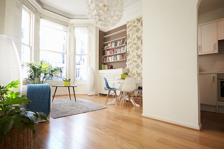 Meeting and Lounge Area with Hardwood floor and a white colourway